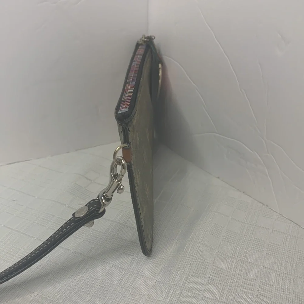 Vintage Dooney and Bourke oversized wristlet with rainbow zipper